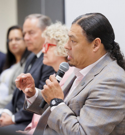 Professionals sitting around a table having a meeting