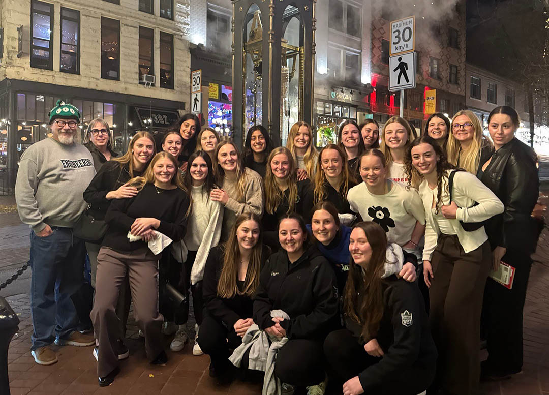 Maguire and the Huskie Women’s Hockey Team in Vancouver, November 2025. (Photo: Submitted)